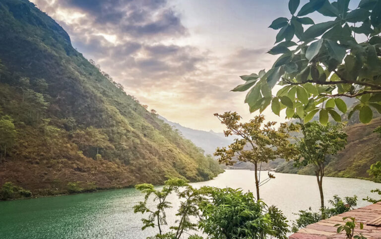 Sonnenuntergang am Nho Que Fluss