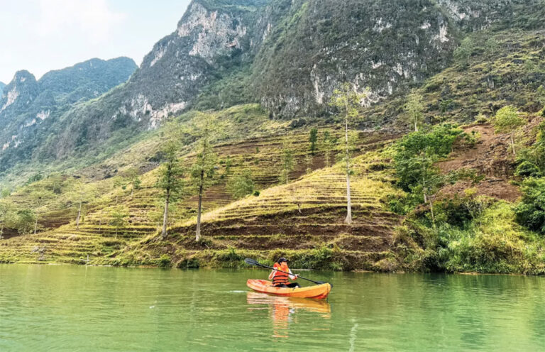 Kajak auf dem Nho Que Fluss